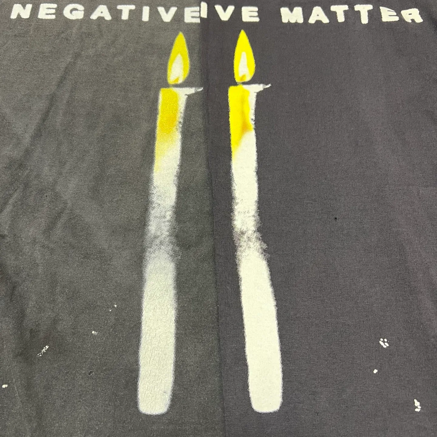 Printing proofing SAINT Mxxxxxx CANDLE LS TEE/BLK Slogan candle distressed long-sleeved TEE Little angel short sleeves on the back Washed black S-XL Original consistent Cylindrical side seam OE yarn fabric Garment dyeing Faded by heavy washes Faded by plaster on bust Correct alignment Original consistent main mark/wash mark/cherub anti-counterfeiting mark Original level printing restoration